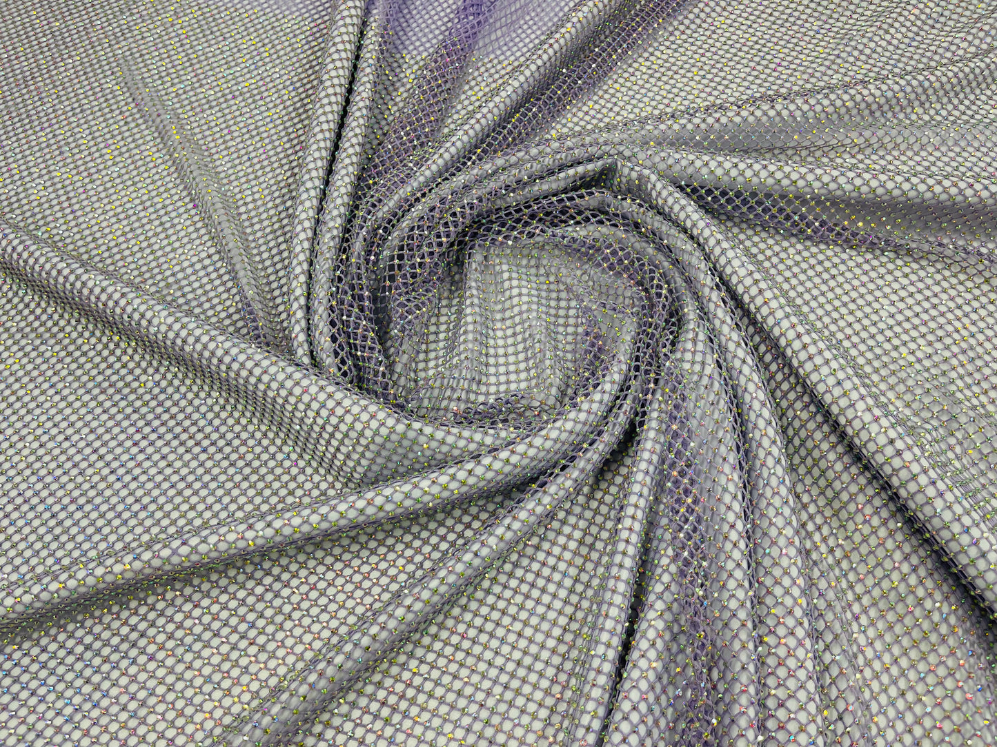 AB Rhinestones on a fish net fabric | New Creation Fabric & Foam Inc ...