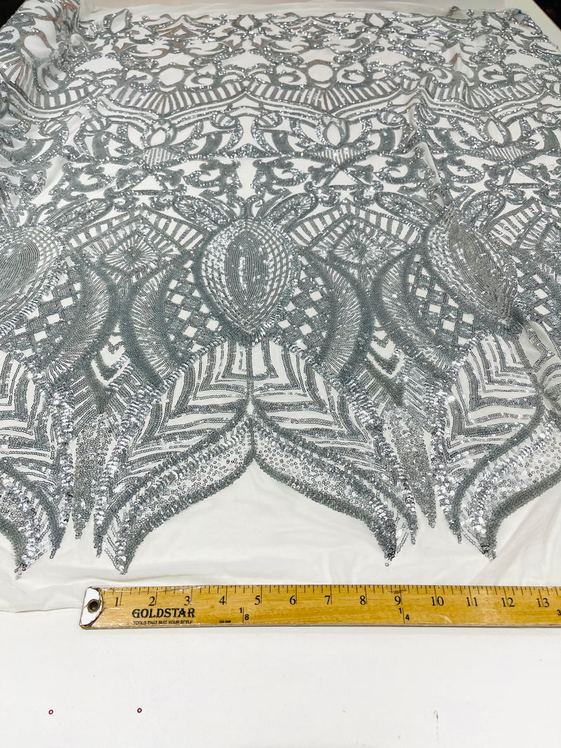 Silver royalty design on a white 4 way stretch mesh-prom-sold by the yard.