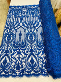 Diva design damask embroidery with heavy beaded on a mesh lace-sold by the yard.