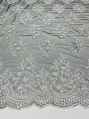 Floral corded embroider with glitter sequins on a mesh lace fabric-sold by the yard