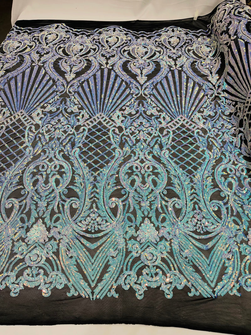 Aqua iridescent sequin damask design on a black 4 way stretch mesh-prom- sold by the yard.