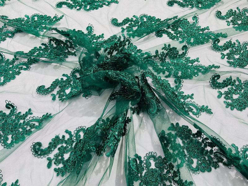 Hunter green metallic floral design embroidery on a mesh lace with sequins and cord-sold by the yard.