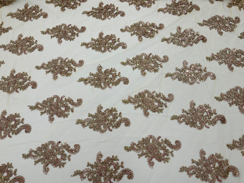 Rose gold  floral design embroidery on a mesh lace with sequins and metallic cord-sold by the yard.