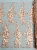 Rosa 3d floral design embroider with rhinestones in a mesh lace-sold by the yard.