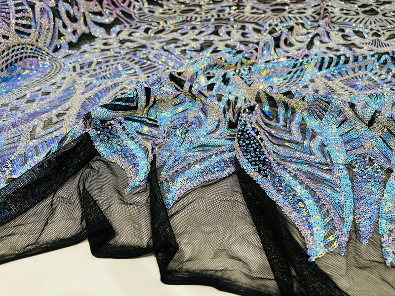 Aqua iridescent royalty design on a black 4 way stretch mesh-prom-sold by the yard.