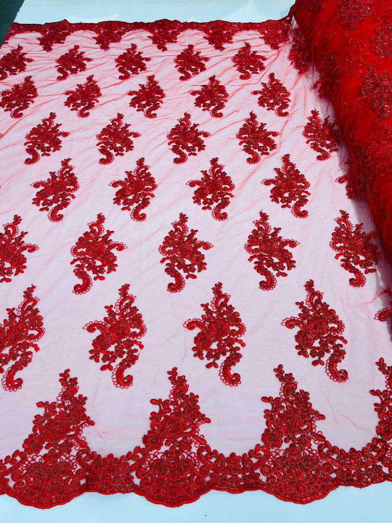 Red metallic floral design embroidery on a mesh lace with sequins and cord-sold by the yard.