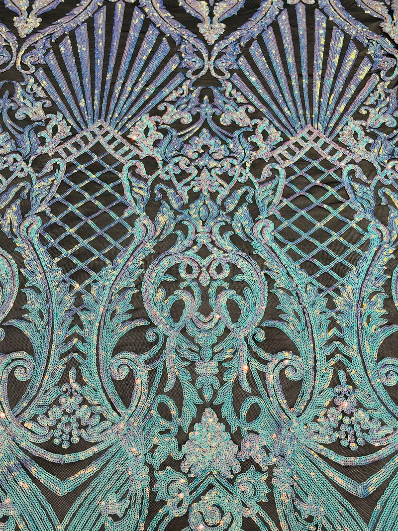 Aqua iridescent sequin damask design on a black 4 way stretch mesh-prom- sold by the yard.