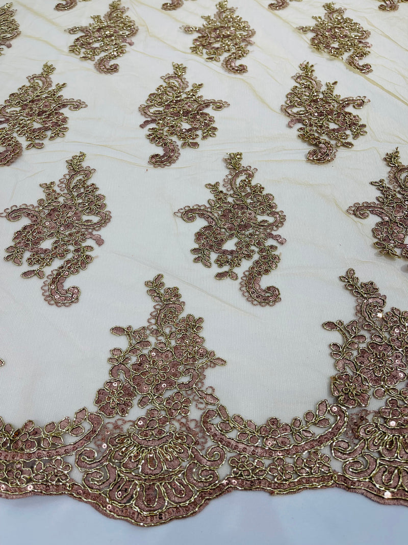 Rose gold  floral design embroidery on a mesh lace with sequins and metallic cord-sold by the yard.