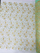 Daisy multi color gold metallic floral design embroider on a red mesh lace-dresses-sold by the yard.