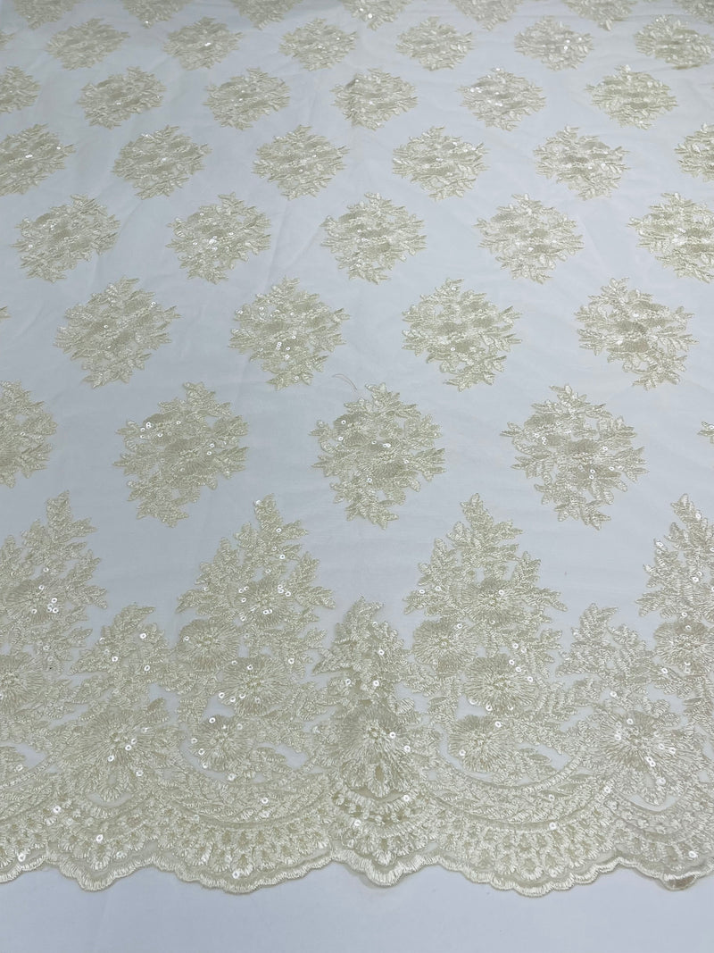 Floral corded embroider with sequins on a mesh lace fabric-sold by the yard