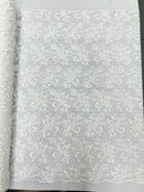 Estrella corded flowers embroider with sequins on a mesh lace fabric-sold by the yard.