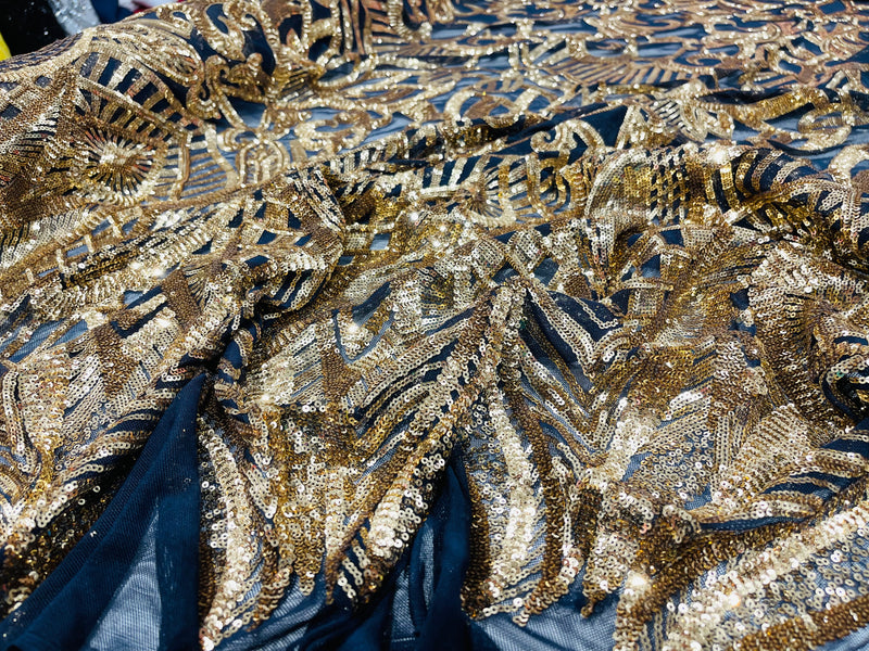 Gold royalty design on a navy 4 way stretch mesh-prom-sold by the yard.