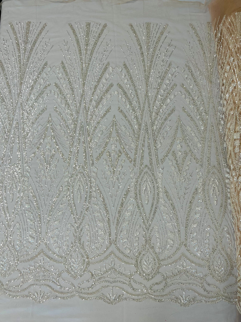 New damask embroider and heavy beaded on a mesh lace fabric-sold by the yard