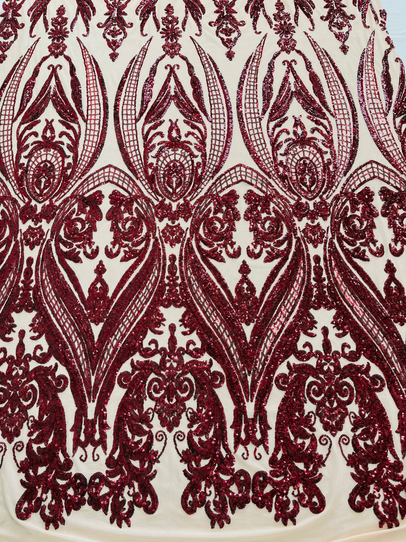 Empire Damask design with sequins embroider on a 4 way stretch mesh fabric-sold by the yard.