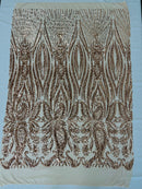 Paisley sequin design on a nude 4 way stretch mesh-prom-sold by the yard.