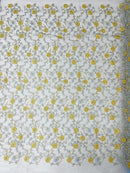 Daisy multi color gold metallic floral design embroider on a red mesh lace-dresses-sold by the yard.