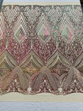 Queens geometric diamond design with shiny sequins on a 4 way stretch mesh fabric- sold by the yard.