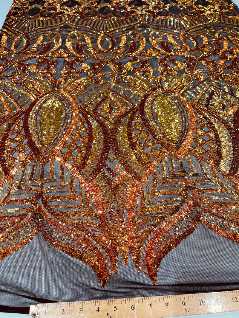 Orange iridescent royalty design on a Black 4 way stretch mesh-prom-sold by the yard.