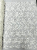 Estrella corded flowers embroider with sequins on a mesh lace fabric-sold by the yard.