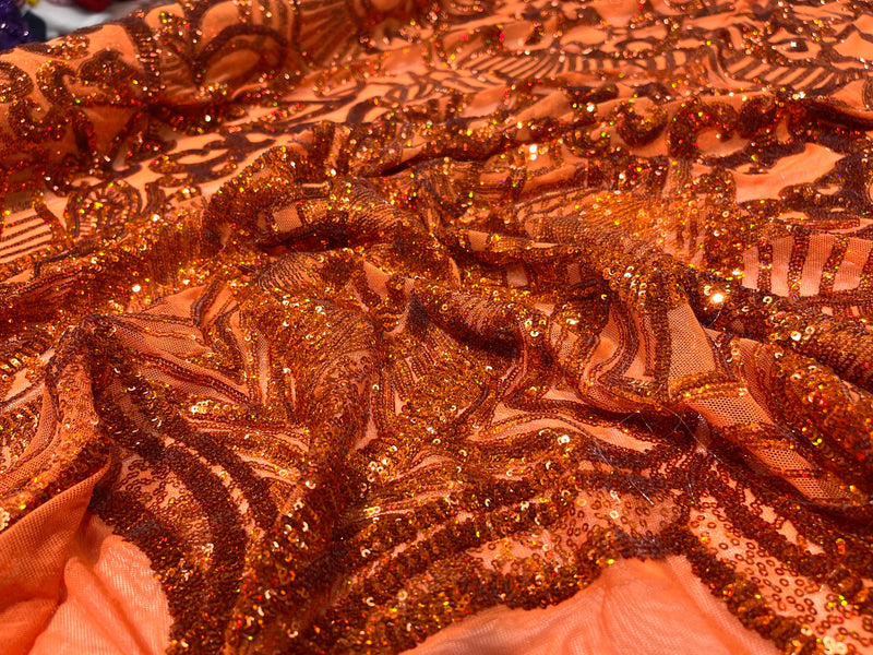 Burnt Orange iridescent royalty design on a 4 way stretch mesh-prom-sold by the yard.