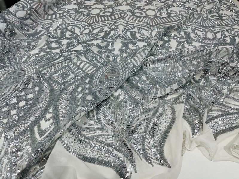 Silver royalty design on a white 4 way stretch mesh-prom-sold by the yard.