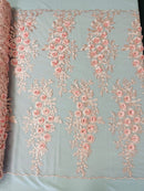 Rosa 3d floral design embroider with rhinestones in a mesh lace-sold by the yard.