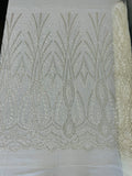 New damask embroider and heavy beaded on a mesh lace fabric-sold by the yard