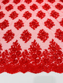 Floral corded embroider with sequins on a mesh lace fabric-sold by the yard