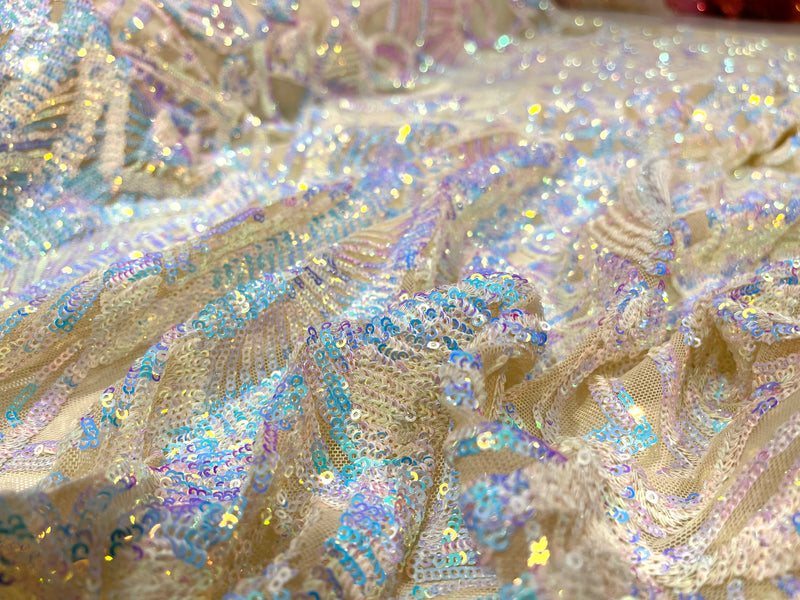 Aqua Clear iridescent royalty design on a champagne 4 way stretch mesh-prom-sold by the yard.
