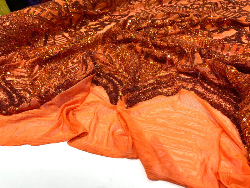 Burnt Orange iridescent royalty design on a 4 way stretch mesh-prom-sold by the yard.