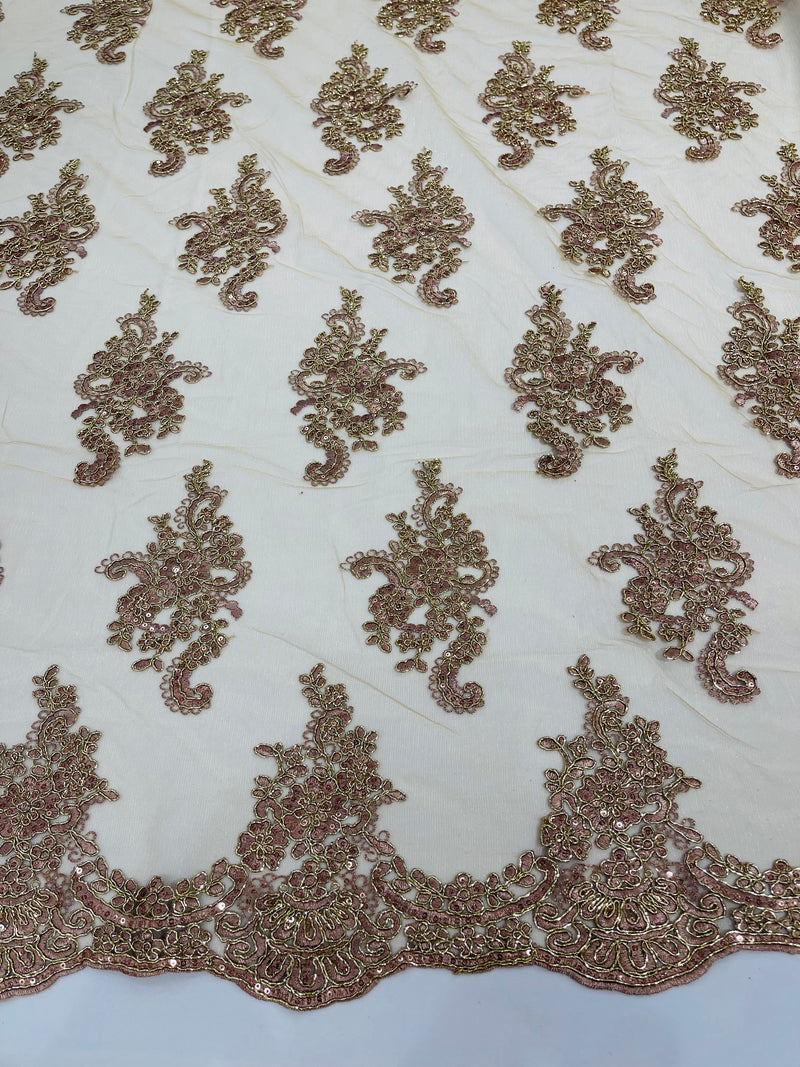 Rose gold  floral design embroidery on a mesh lace with sequins and metallic cord-sold by the yard.