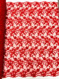 Estrella corded flowers embroider with sequins on a mesh lace fabric-sold by the yard.