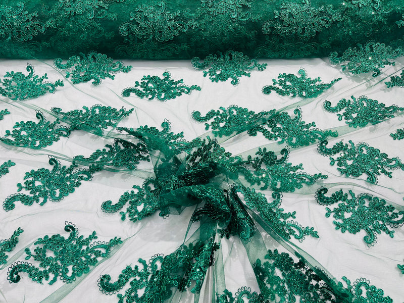 Hunter green metallic floral design embroidery on a mesh lace with sequins and cord-sold by the yard.