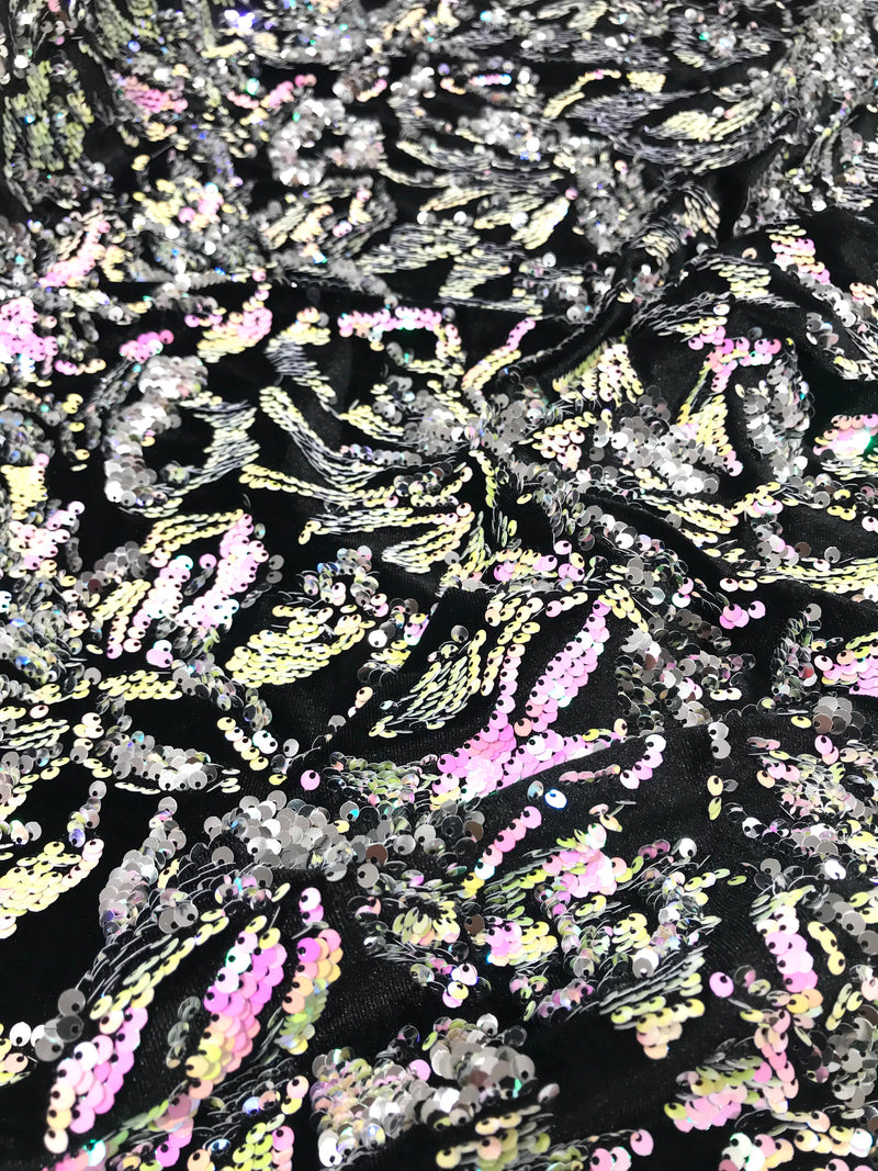 Pink, Silver iridescent sequins flip two tone floral design on a black stretch velvet, Sold by the yard.