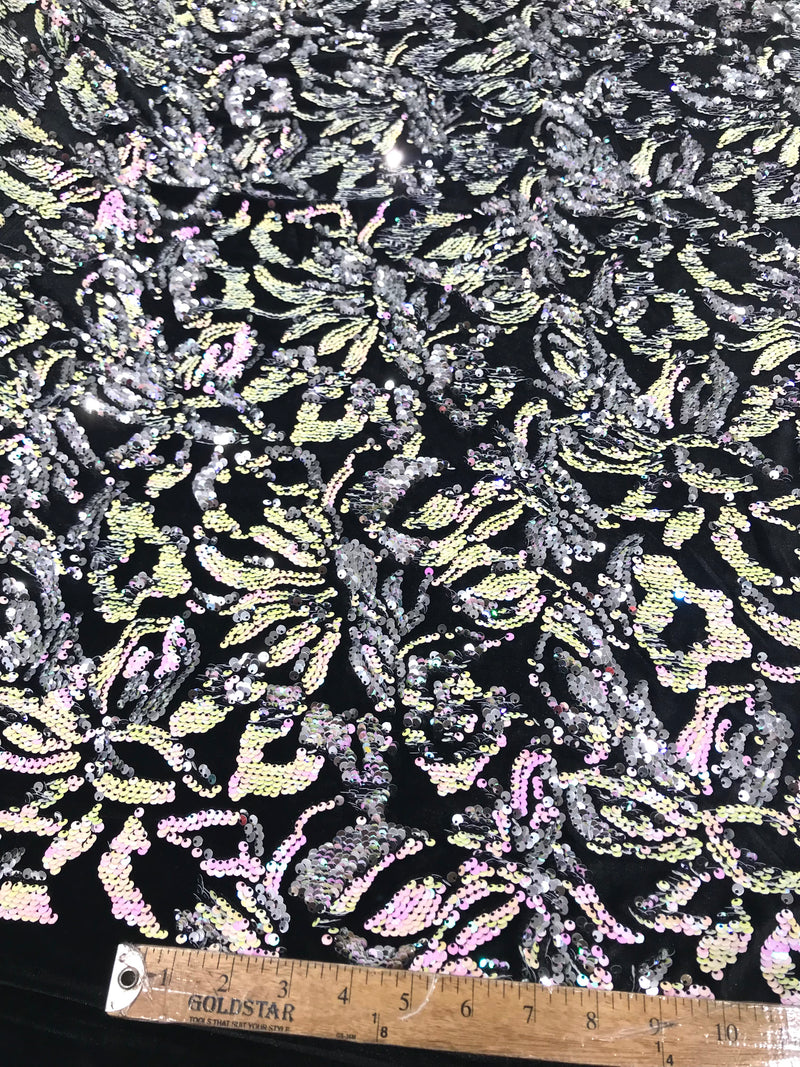 Pink, Silver iridescent sequins flip two tone floral design on a black stretch velvet, Sold by the yard.